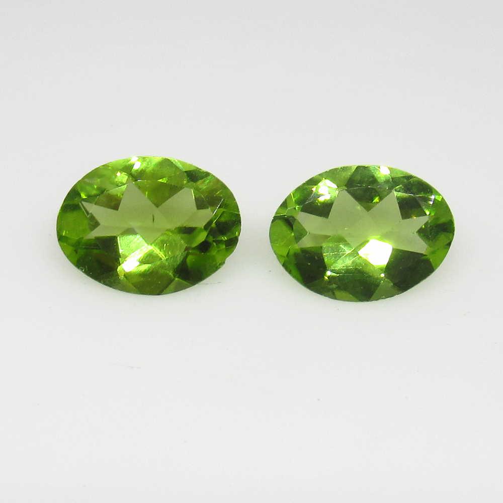 2.60 Ct Genuine Pakistan Peridot Oval Pair: No Reserve! Title: 2.60 Ct Genuine Pakistan Peridot Oval Pair Stone Clarity: VVS Gemstone: Natural Peridot Carat Weights: 2.60 Size/Dimensions: 9.00 x 6.70 x 3.40 mm / 2 PC's Top Class Full Luster / E