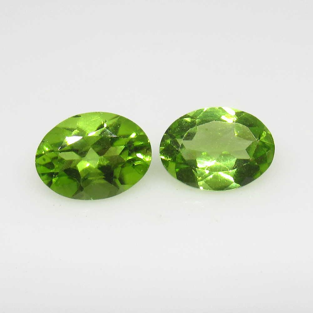 2.36 Ctw Natural Pakistan Peridot Oval Pair: No Reserve! Title: 2.36 Ctw Natural Pakistan Peridot Oval Pair Stone Clarity: VVS Gemstone: Peridot Carat Weights: 2.36 Size/Dimensions: 7.90 x 6.00 x 4.00 mm / 2 PC's Top Class Luster / Excellent Ova