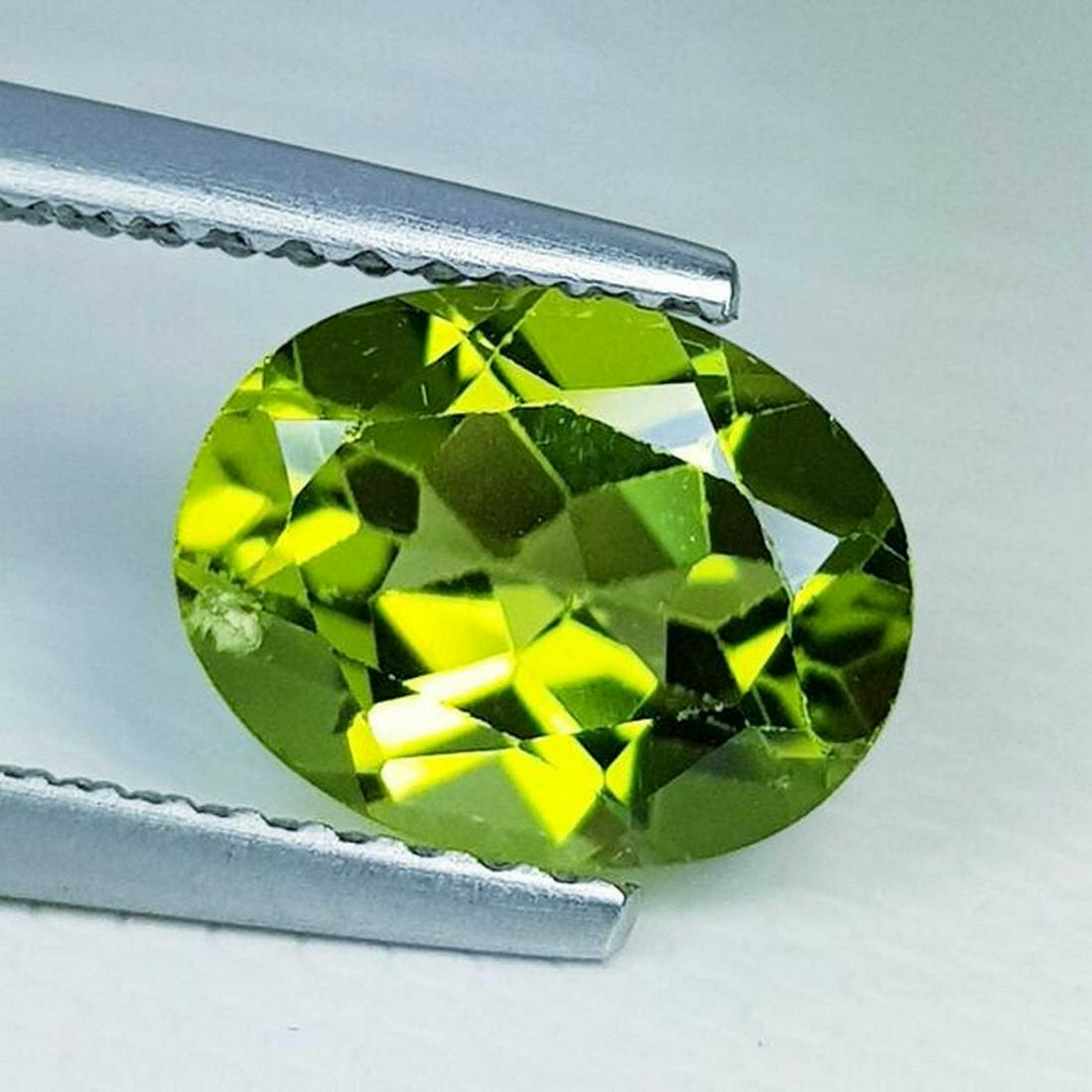 Natural Peridot Oval Cut 1.82 ct: No Reserve! Title: Natural Peridot Oval Cut 1.82 ct Color/Clarity: IF - VVS Loosegemstone Carat Weights: 1.82 Size/Dimensions: 9.00 x 7.00 x 4.20 Oval - Pakistan Shipping: Worldwide: Flat-rate of $10.