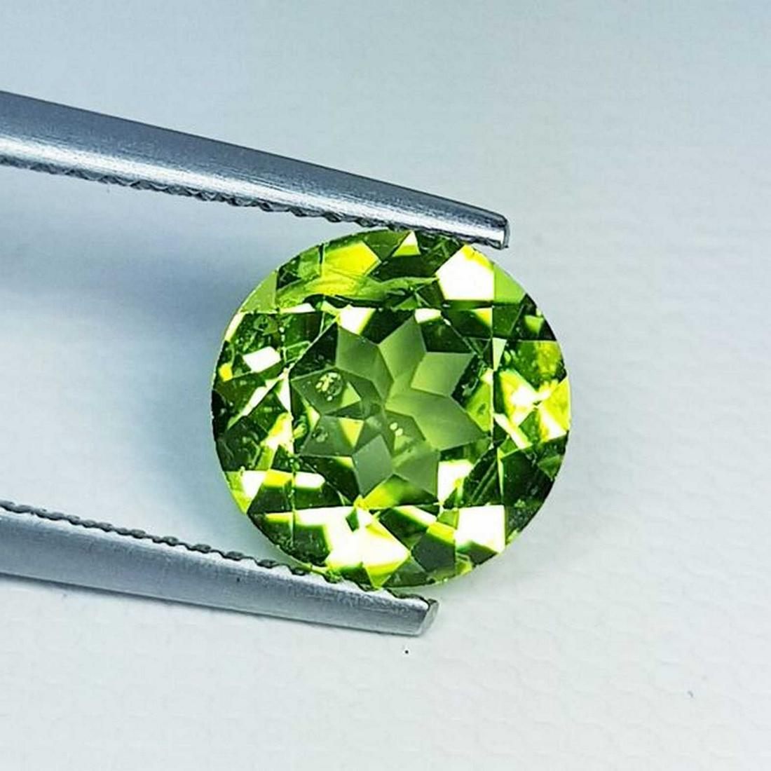 Natural Peridot Round Cut 2.75 ct: No Reserve! Title: Natural Peridot Round Cut 2.75 ct Color/Clarity: IF - VVS Loosegemstone Carat Weights: 2.75 Size/Dimensions: 9.00 x 9.00 x 5.50 Round - Pakistan Shipping: Worldwide: Flat-rate of $1