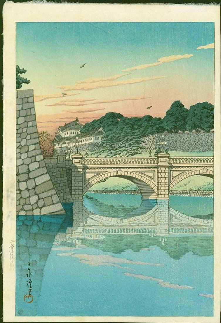 Kawase Hasui Japanese Woodblock Print - Morning, Niju: Kawase Hasui Morning at Niju Bridge (Sunset variant) Size: Oban. Approximately 15.5 x 10.5 inches. Date: 1930. Publisher: Watanabe Shozaburo. Bears the 6 mm publisher's seal, indicating a lifetime edi