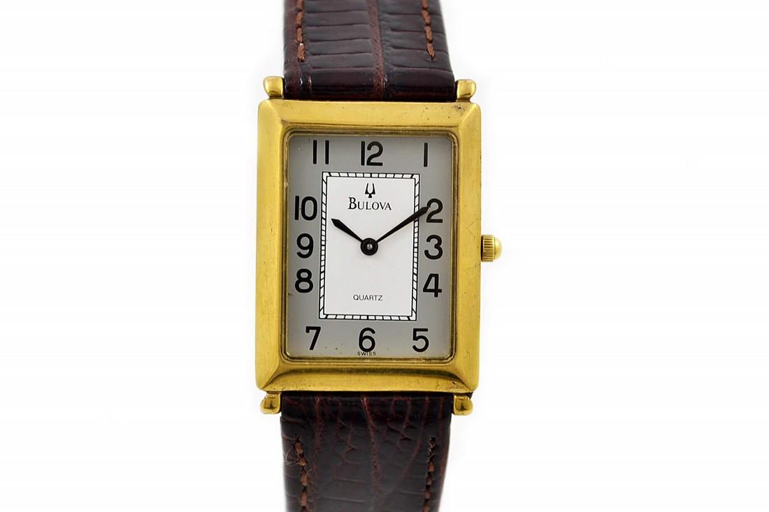 Vintage Bulova Classic 1624 Gold Plated Midsize Quartz: Title: Vintage Bulova Classic 1624 Gold Plated Midsize Quartz Dress Watch Brand: Bulova Date: 1990s Model: Classic 1624 Movement: Quartz Functions: Time Case Metal: Gold Plated Case Size: 24x36mm Dial