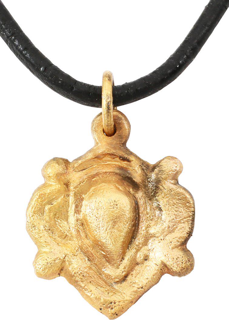 VIKING HEART PENDANT NECKLACE C.1000 AD JEWELRY: A good example in its fully evolved form. High relief with a centered naturalistic heart with beaded surround flanked by reverse curves forming the quartered nubs. Just over 3/4” height, made by the