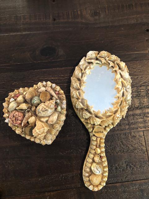 Early 1900s Seashell Souvenir Items: Title: Early 1900s Seashell Souvenir Items Dimension: Mirror is approximately 10 inches long box is approximately 4 inches long and 2 inches deep. Shipping: Domestic: Flat-rate of $20.00 to anywhere w