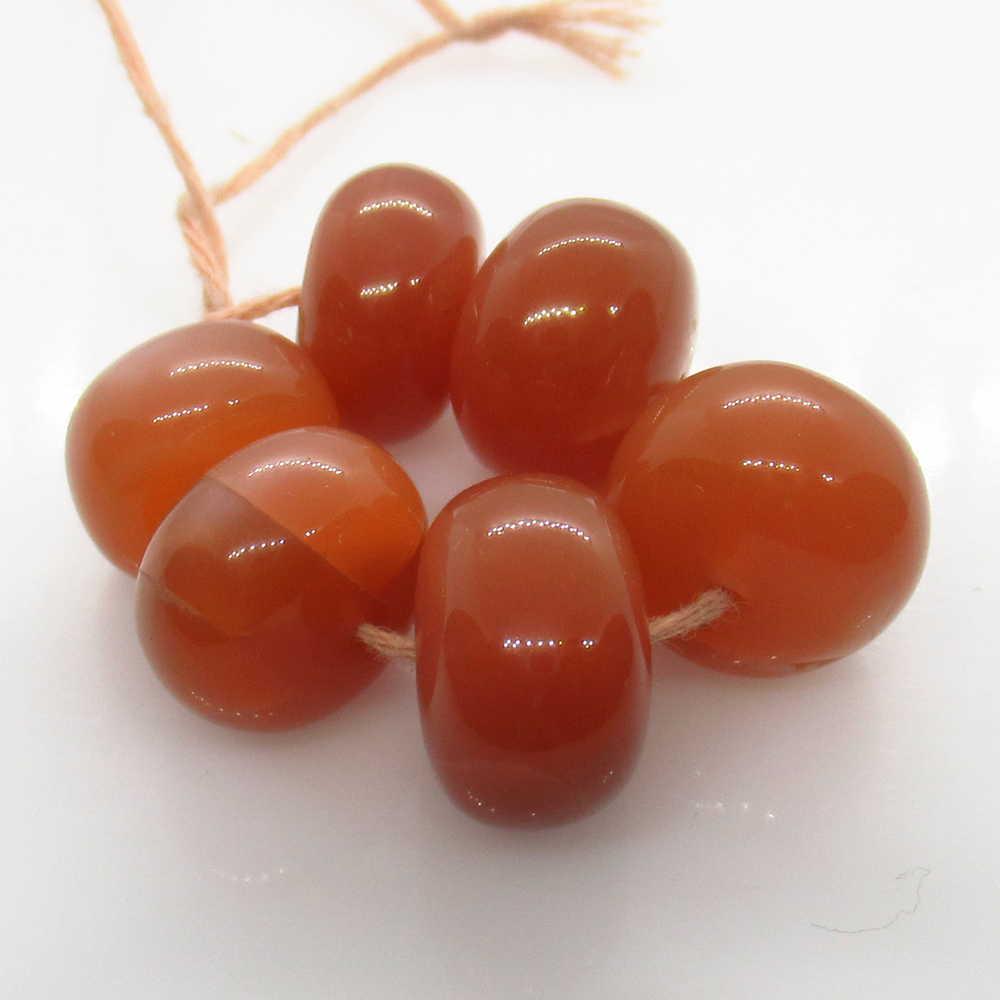 43.97 Ct Natural 6 Orange Sunstone Drilled Round Beads: No Reserve! Title: 43.97 Ct Natural 6 Orange Sunstone Drilled Round Beads Stone Clarity: Opaque Gemstones: Natural Sunstone Beads Carat Weights: 43.97 Size/Dimensions: 10.80 to 12.00 mm / 6 PC's Addit