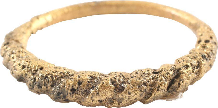 FINE VIKING TWISTED RING 9TH CENTURY AD, SIZE 10: Large size 10. The band with raised twist segment in the full round to the top half. That form rarely encountered. The spiral or helix was a form of particular interest to Vikings. It was used in full