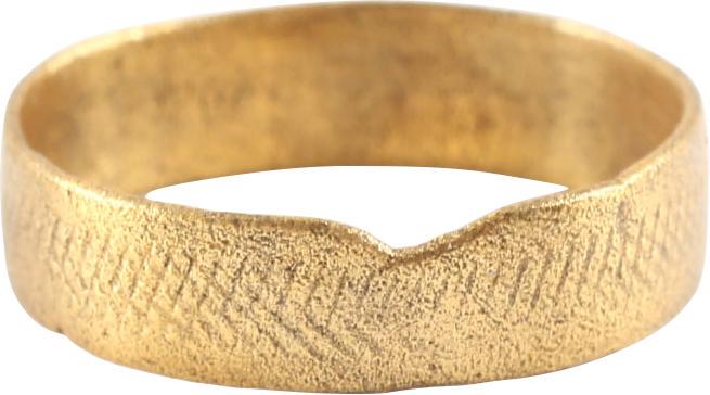 FINE VIKING WEDDING RING, 866-1067 AD JEWELRY SIZE 7 ½: Cambridgeshire England. Gilt bronze, size 7 1/2. 2.9mm width slightly rounded band. Early construction with the band cast with a central core to distribute the metal and heat. The core than laboriousl
