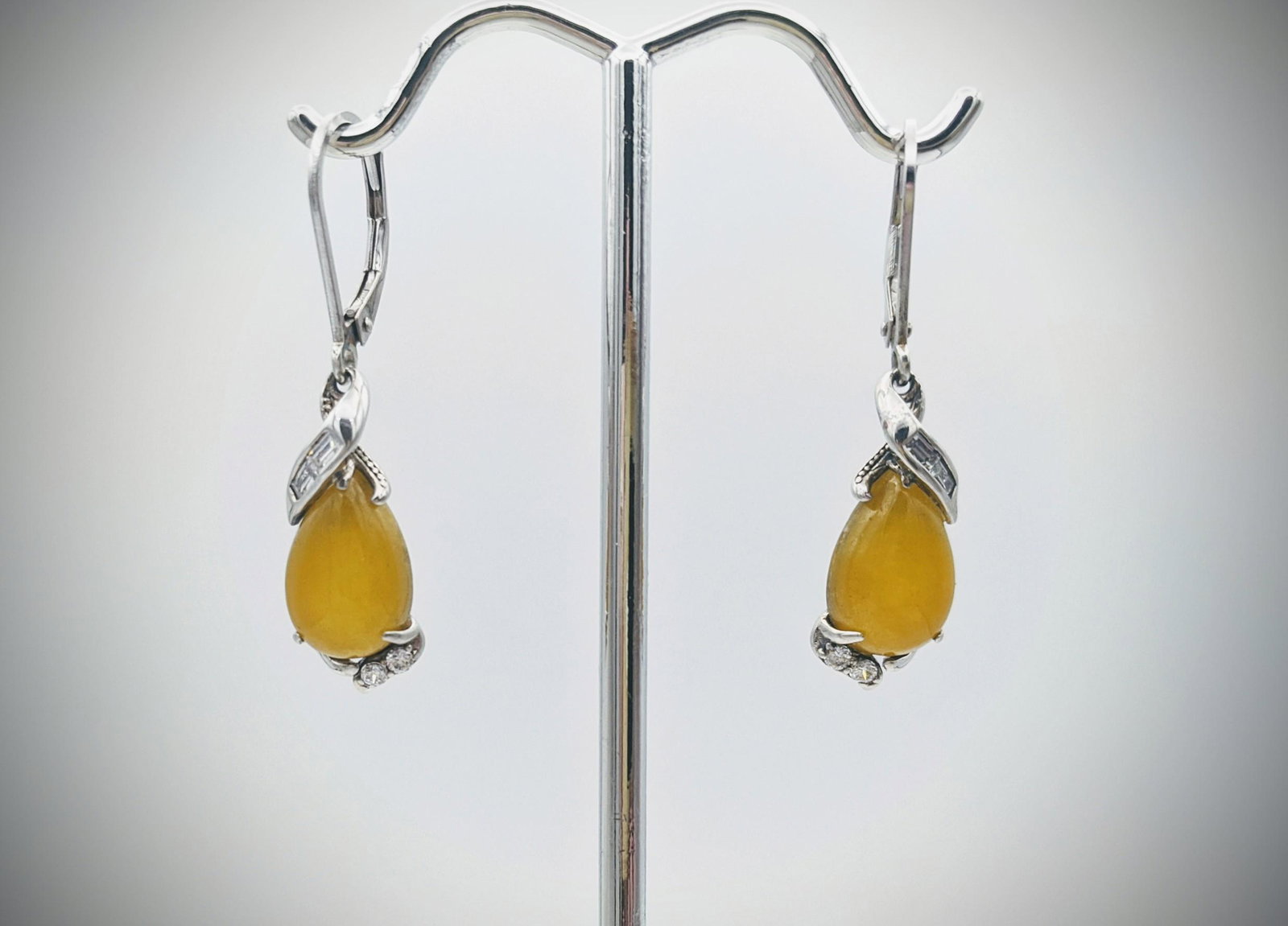 Sterling Silver Yellow Jadeite & Cubic Zirconia: Title: Sterling Silver Yellow Jadeite & Cubic Zirconia Earrings Brand: Jean Lin Collection Metal Purity: 925 Sterling Silver Gemstones: Yellow Jadeite & Cubic Zirconia Carat Weights: Each Earring has 