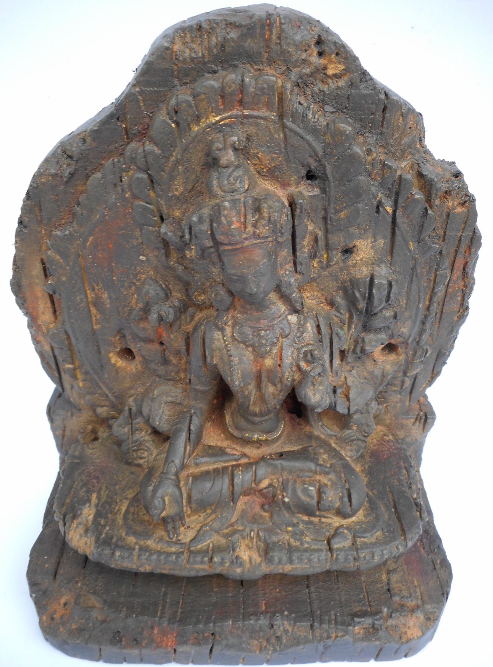 Green Tara Figure: Title: Green Tara Figure Origin: Nepal Date: 18th century Materials: wood with traces of gilt and polychrome Size: high 28 - large 22 - deep 13 cm Reserve: $300.00 Shipping: Domestic: Flat-rate of $50