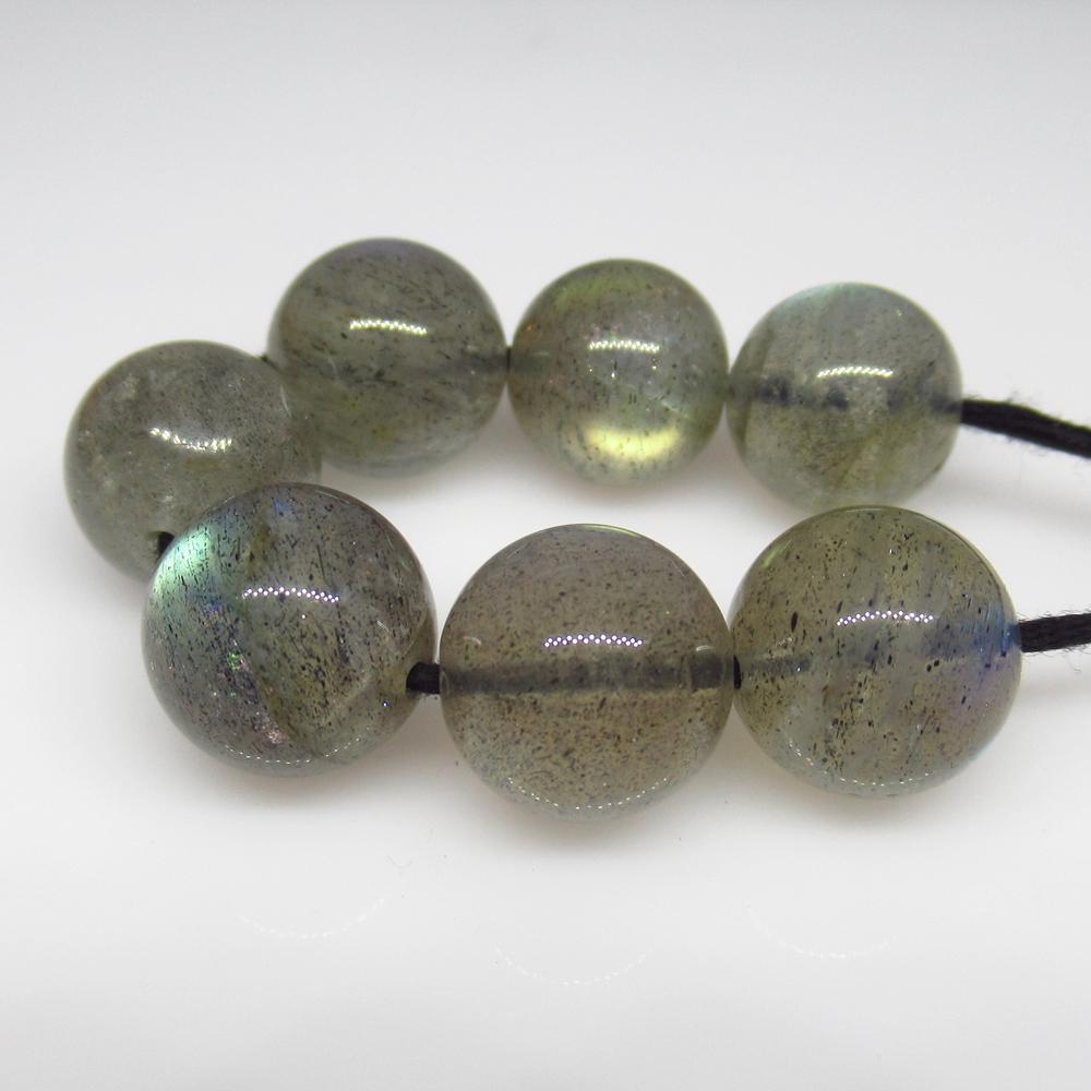 46.30 Ct Natural 7 Labradorite Drilled Ball Beads: No Reserve! Title: 46.30 Ct Natural 7 Labradorite Drilled Ball Beads Stone Clarity: Transparent Gemstone: Natural Labradorite Beads Carat Weights: 46.30 Size/Dimensions: 9.70 - 10.10 mm / 7 PC's Drill