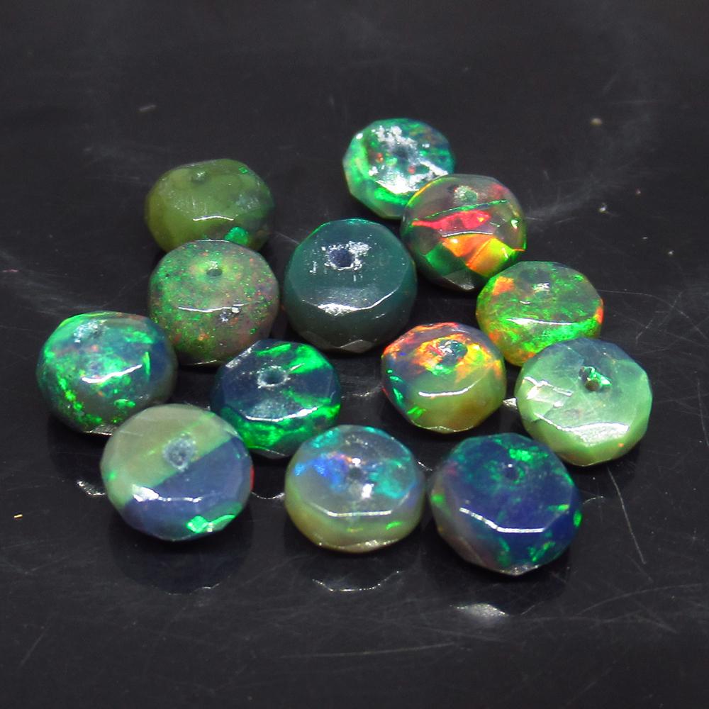 5.29 Ct Natural 13 Drilled Faceted Fire Black Opal: No Reserve! Title: 5.29 Ct Natural 13 Drilled Faceted Fire Black Opal Beads Stone Clarity: Translucent Gemstone: Natural Faceted Black Opal Beads Carat Weights: 5.29 Size/Dimensions: 4.90 to 5.40 mm /