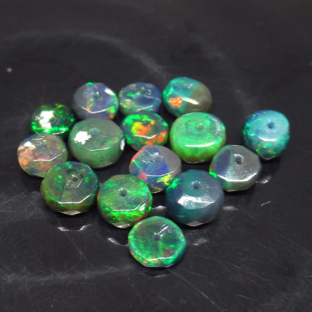 5.22 Ct Natural 15 Drilled Faceted Fire Black Opal: No Reserve! Title: 5.22 Ct Natural 15 Drilled Faceted Fire Black Opal Beads Stone Clarity: Translucent Gemstone: Natural Faceted Black Opal Beads Carat Weights: 5.22 Size/Dimensions: 4.40 to 5.40 mm /