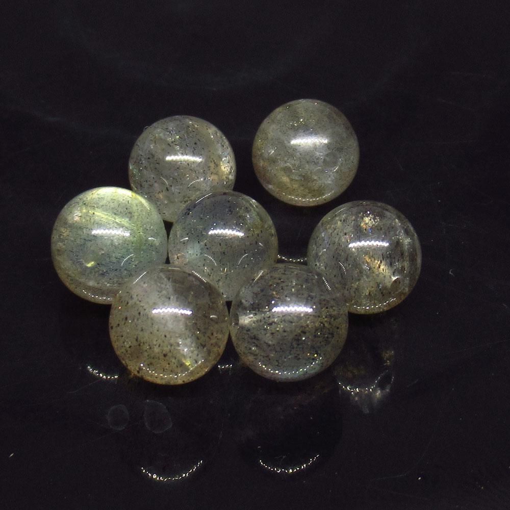 26.25 Ctw Natural 7 Labradorite Drilled Round Ball: No Reserve! Title: 26.25 Ctw Natural 7 Labradorite Drilled Round Ball Beads Stone Clarity: Transparent Gemstone: Labradorite Beads Carat Weight: 26.25 Size: 8.20 - 8.50 mm / 7 PC's Drilled Round Ball