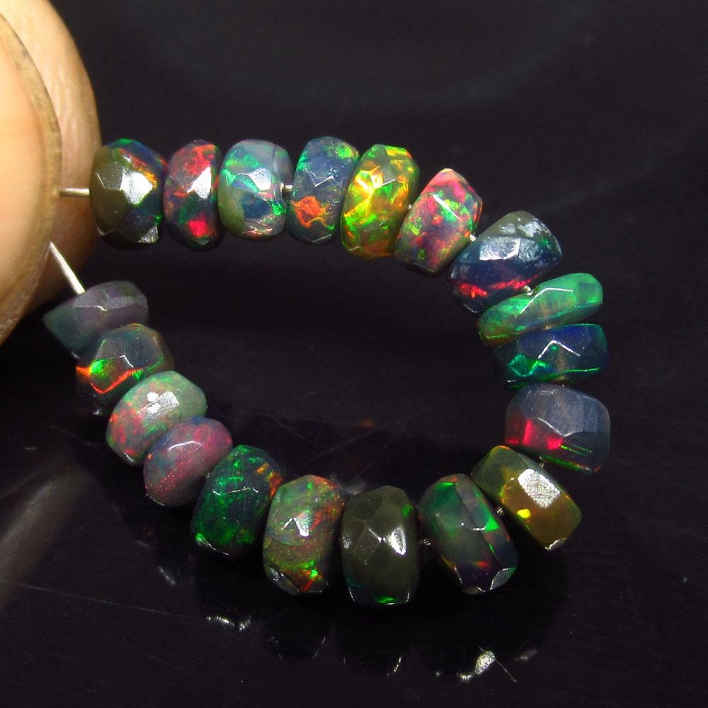 4.11 Ctw Natural 19 Drilled Faceted Black Opal Beads: No Reserve! Title: 4.11 Ctw Natural 19 Drilled Faceted Black Opal Beads Stone Clarity: Translucent Gemstone: Faceted Black Opal Beads Carat Weight: 4.11 Size: 3.90 to 4.30 mm / 19 PC's Drilled Round F
