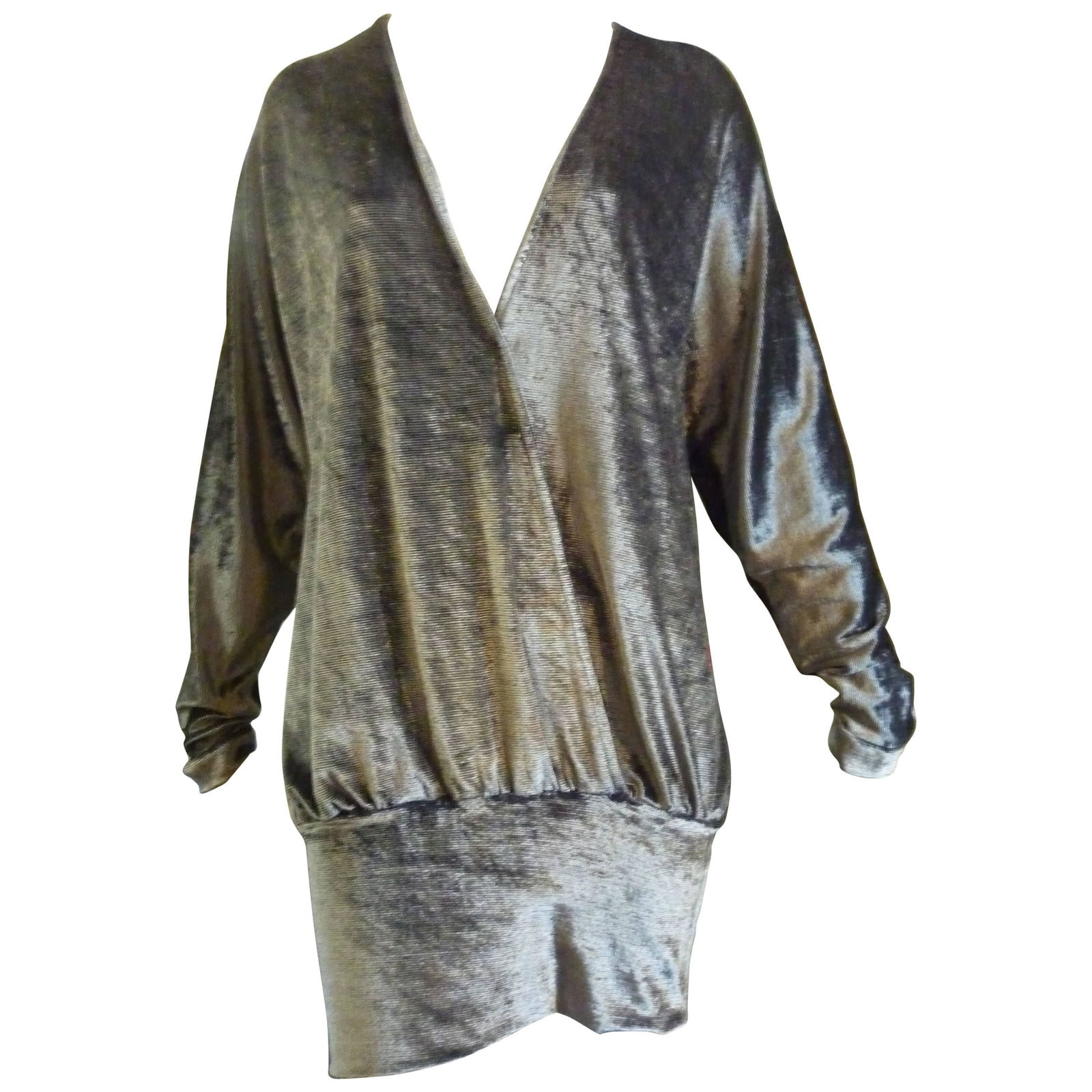 1980s Pierre Balmain Grey Mini Dress/Tunic (44 Fr): I am unable to ascertain whether this piece was designed by Pierre Balmain prior to his passing, or Erik Mortenson. The piece is blouson on top with bat sleeves, and straight and narrow at the bottom.