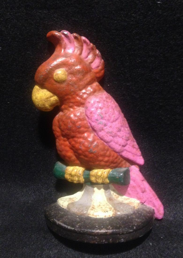 C1900 Cast Iron Parrot Doorstop In Colorful Paint: Title: C1900 Cast Iron Parrot Doorstop In Colorful Paint Dimension: 8" high Shipping: Domestic: Flat-rate of $15.00 to anywhere within the contiguous U.S. International: Foreign shipping rates are det