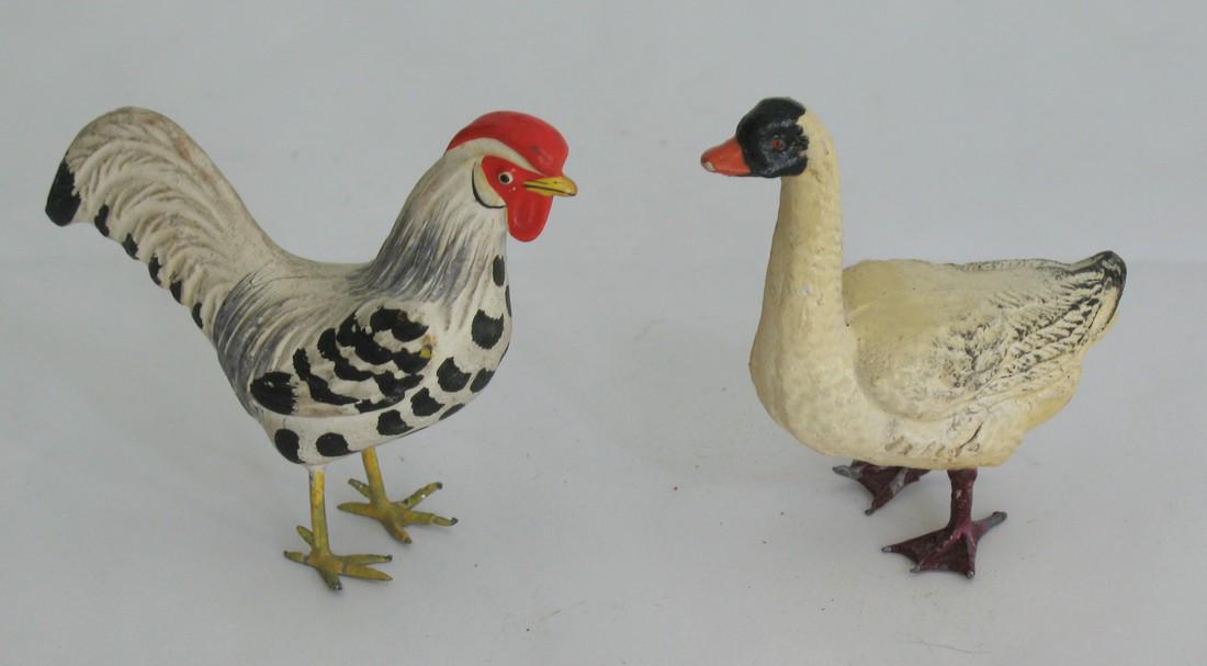 Early Composition Chicken & Goose.: Title: Early Composition Chicken & Goose. Date/Period: 1930's Dimension: 2 1/2” tall Description:Very nice early composition chicken & goose in great condition and strong colors. Probably made in Ge