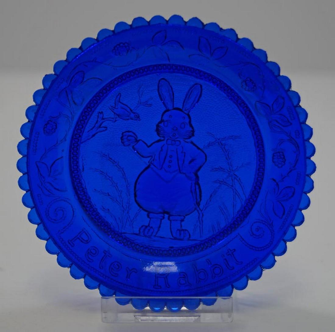 Vintage Peter Rabbit Easter Pairpoint Cup Plate: Title: Vintage Peter Rabbit Easter Pairpoint Cup Plate Dimension: App. 3 1/2" diameter. Provenance:Charming Easter decoration. A Pairpoint Cup Plate, produced in 1975, Peter Rabbit design, Cobalt Blue