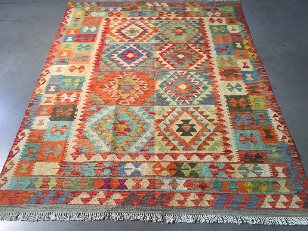 COLORFUL HAND KNOTTED KLIM 5x6.6: Title: COLORFUL HAND KNOTTED KLIM 5x6.6 Description: 5'.0"X 6'.6" Colorful 100% wool reversible Klim rug in multi pastel colors Hand Knotted in Pakistan Reserve: $80.00 Shipping: Domestic: Flat-rate o