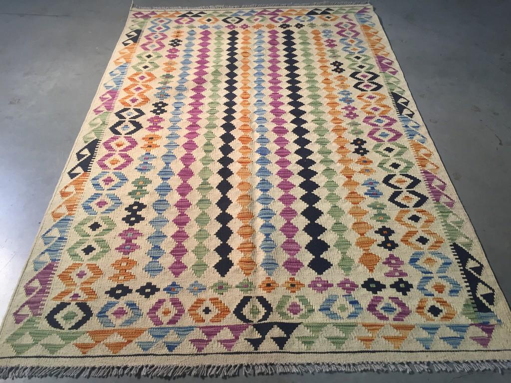 COLORFUL HAND KNOTTED KLIM 4.3x6.3: Title: COLORFUL HAND KNOTTED KLIM 4.3x6.3 Description: 4'.3"X 6'.6" Colorful 100% wool reversible Klim rug in multi pastel colors Hand Knotted in Pakistan Reserve: $80.00 Shipping: Domestic: Flat-rate