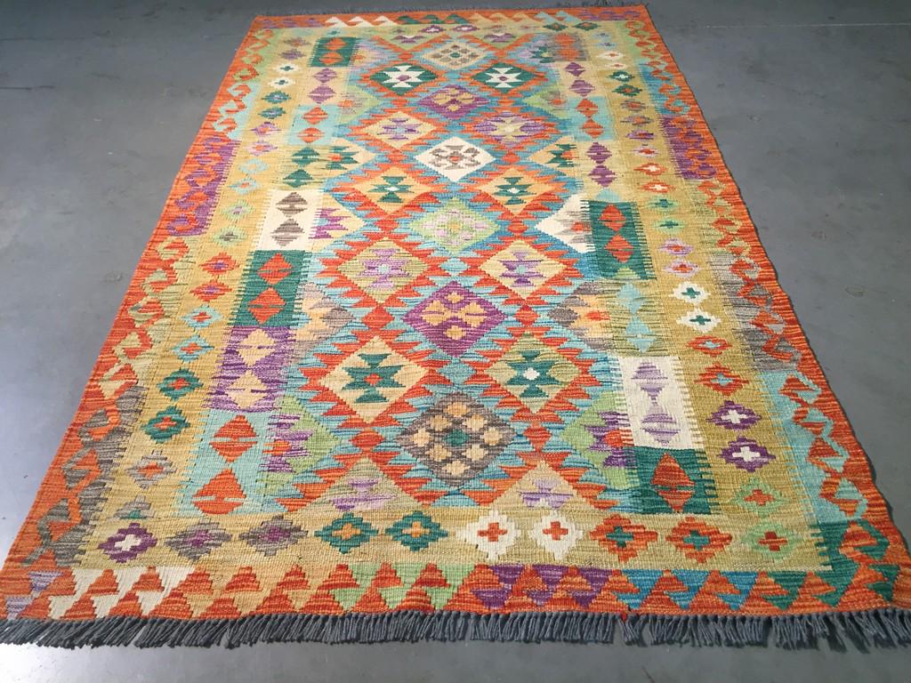 COLORFUL HAND KNOTTED KLIM 4x6: Title: COLORFUL HAND KNOTTED KLIM 4x6 Description: 4'.0"X 6'.0" Colorful 100% wool reversible Klim rug in multi pastel colors Hand Knotted in Pakistan Reserve: $90.00 Shipping: Domestic: Flat-rate of 