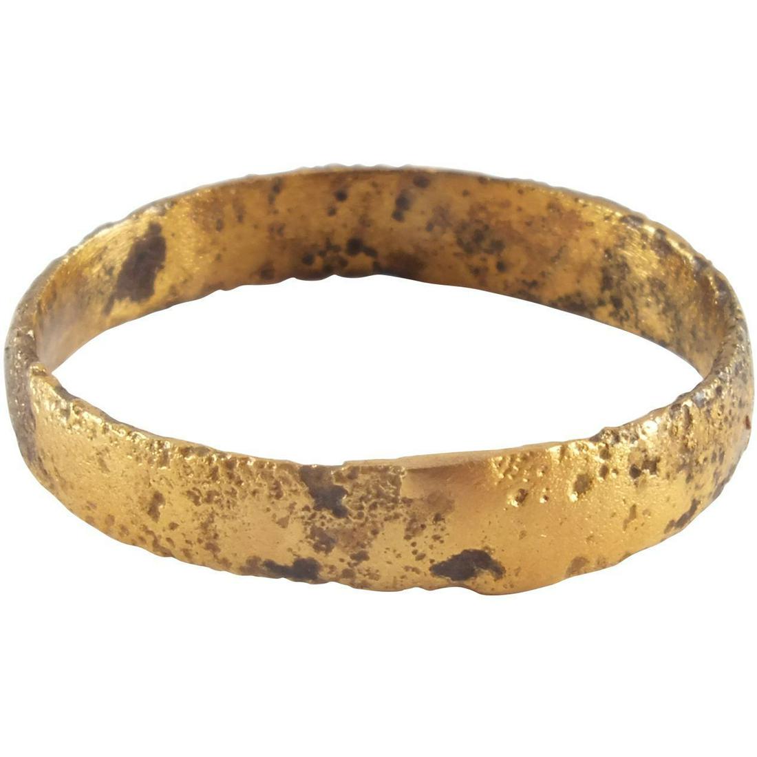 VIKING MAN’S WEDDING RING 10th-11th CENTURY SIZE: Gilt bronze, size 9. Rounded band. Professionally refurbished with the gold overlay restored. Vikings exchanged wedding rings on the pommel of the groom’s sword. Gift boxed with a certificate of aut