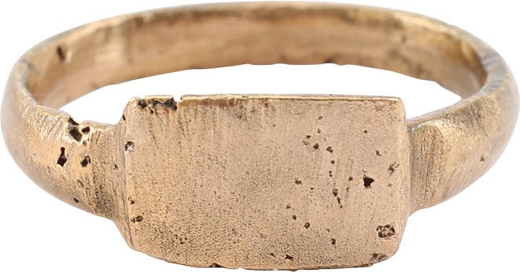 ANCIENT MEDIEVAL WOMAN’S RING SZ 5 1/4 JEWELRY: Early Christian period, C.800-950 AD. Woman’s size 5 1/4 with 2.8mm width band flared at the shoulders and raised flat rectangular bezel. Professionally refurbished with the 24karat gold surface res
