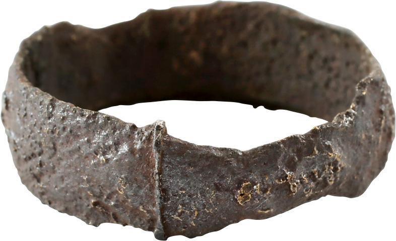 RARE VIKING WEDDING RING C.850-1050 JEWELRY SIZE 10 ¾.: No Reserve! Bronze, rounded face band with relief decoration in alternate broad x and diamond motif. Size 10 3/4 and broad 7.5mm width. Untouched as found condition with a surface textured/eroded from