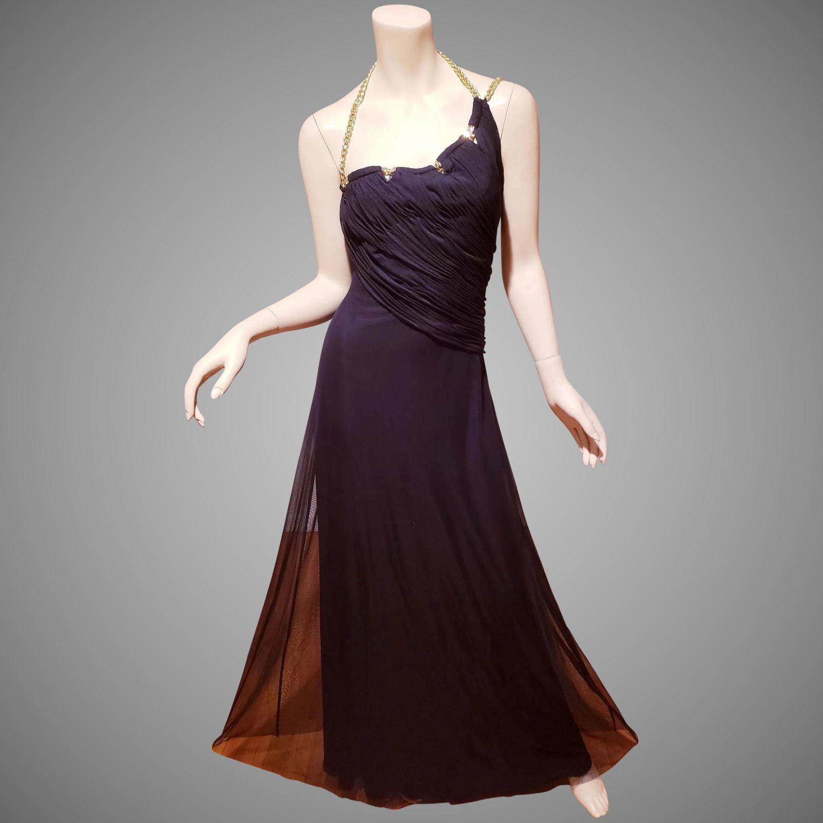 Vtg Calvin Klein NWT old Stock Golden Chain Maxi Gown: Diagonal Halter maxi Calvin Klein Evening gown with thick Golden double chain effect at shoulder . Turn head stunning with a draped plunged back . The Bodice is Shirred. New old stock still has the or