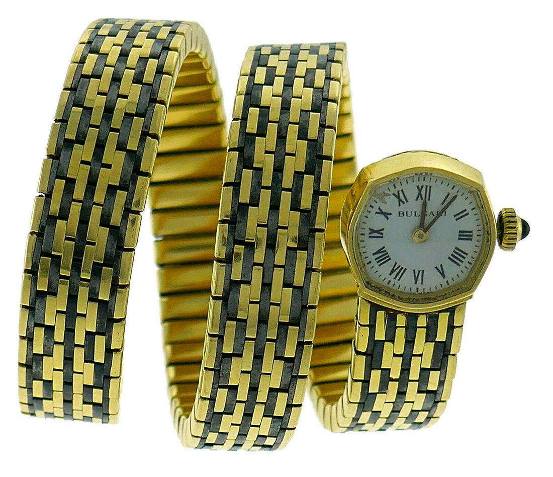 Vintage Bvlgari Gold WATCH Wrap BRACELET Bulgari 1970s: VK JJTOO Bvlgari Vintage 18 karat Yellow Gold Wrap Bracelet Watch Bulgari Iconic Bvlgari wrap bracelet watch created in Italy in the 1970s. Fits up to 6-inch (15-centimeters) wrist. Weight is 105.3 gr