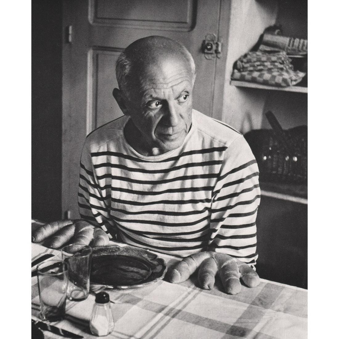 ROBERT DOISNEAU - Picasso and the Loaves, 1952: Artist: ROBERT DOISNEAU Print Title: Picasso and the Loaves, 1952 Medium: Sheet-fed Gravure Printing Date: 1970's Printed in France Image Size: 8.5 x 7 inches Robert Doisneau (1912-1994) was a French