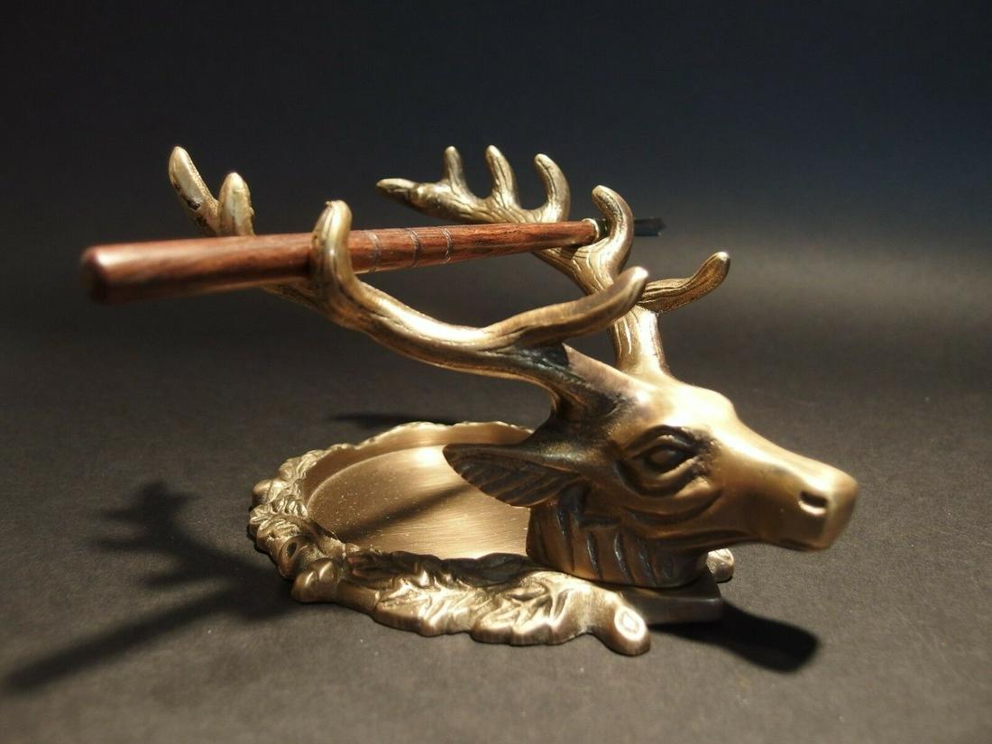 Brass Elk Deer Stag Pen Inkwell Holder Desk Stand: 6 5/8" Long 4 1/4" wide x 3 5/8" Tall Nice reproduction of an antique pen holder. Pen and inkwell shown is not included.... (is available separately) This piece is all solid brass, well made! Good qua