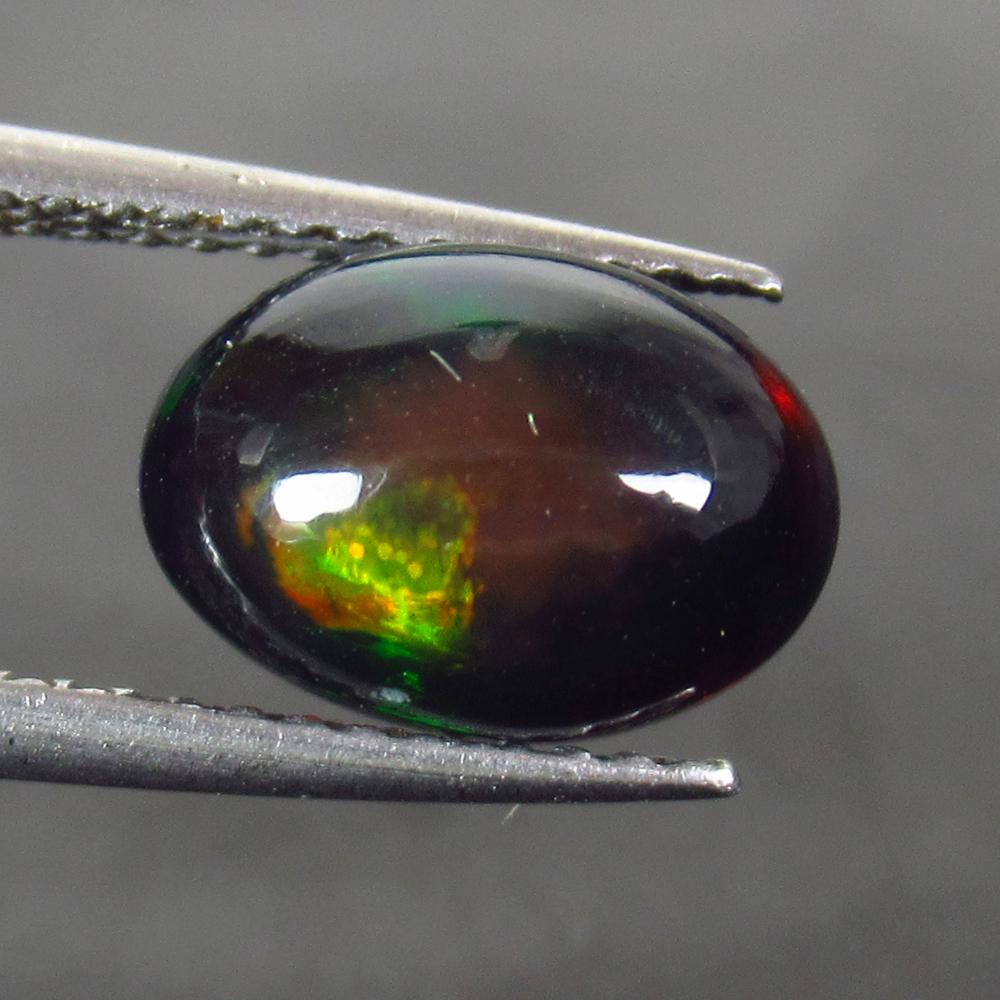 1.65 Ct Natural Ethiopian Fire Black Opal Oval Cab (1 of 2)