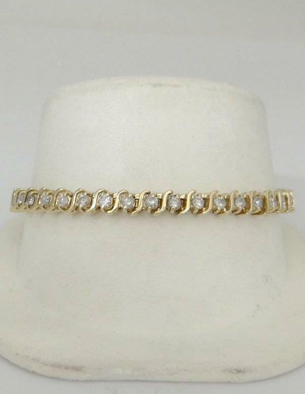 14K YELLOW GOLD 4.00ct ROUND DIAMOND WIDE "S" LINK: 14K YELLOW GOLD 4.00ct ROUND DIAMOND WIDE "S" LINK TENNIS BRACELET 5mm 7 1/4" 35151SHCS Ladies 14k Yellow Gold (not plated or gold filled) 4.00ct Diamond Tennis Bracelet! VERY PRETTY BRACELET! This br