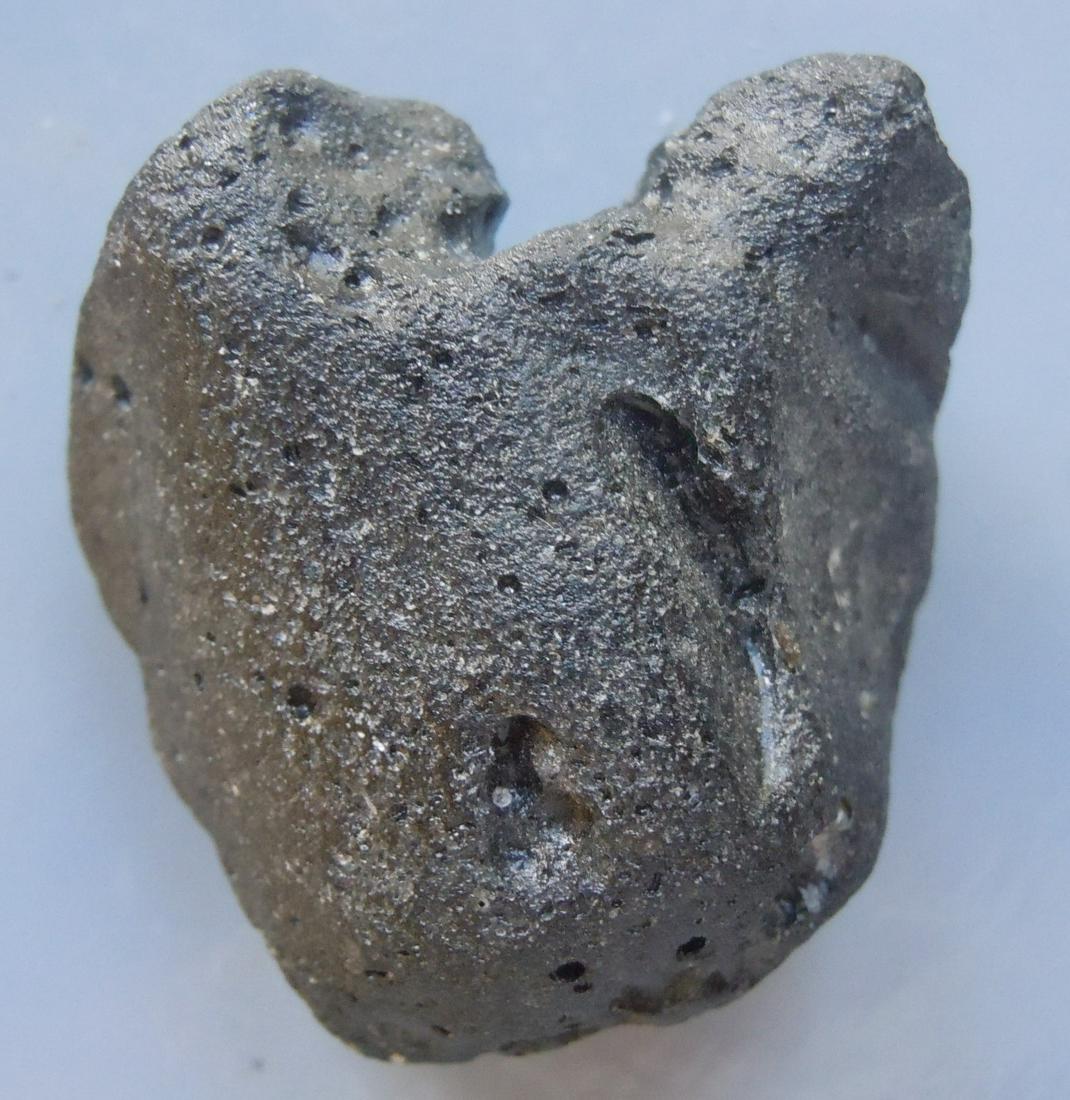 PHILIPPINITE TEKTITE - FROM METEORITE IMPACT: Title: PHILIPPINITE TEKTITE - FROM METEORITE IMPACT Origin: Paracale, Camarines Norte, Luzon, Philippines Size: 3x2.5x1.5 cm / 15 gram Additional Information: weird shaped rizalite/philippinite tektit