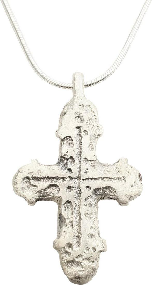 MEDIEVAL PILGRIM’S RELIQUARY CROSS 7th-10th C. JEWELRY: Silvered bronze. 7th-11th century. Just over 1 5/8Â” height, trefoil beam terminals with very slightly raised cross beam. Plain cross incised within. The back recessed for a sacred relic. Good quai