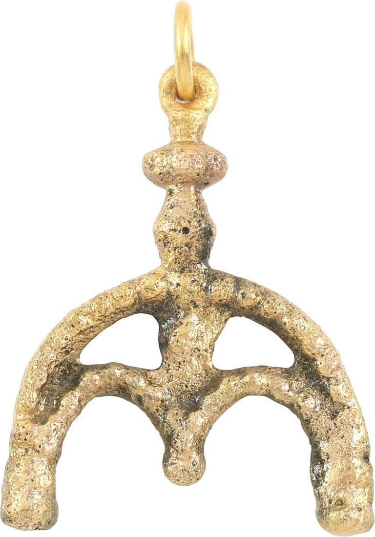 ANCIENT VIKING LUNAR PENDANT C.900-1000 AD: As expert navigators, the constellations signified mystery and power to Vikings. Lunar pendants were worn as pectorals as well as suspended from belts, other clothing and horse harnesses. This example