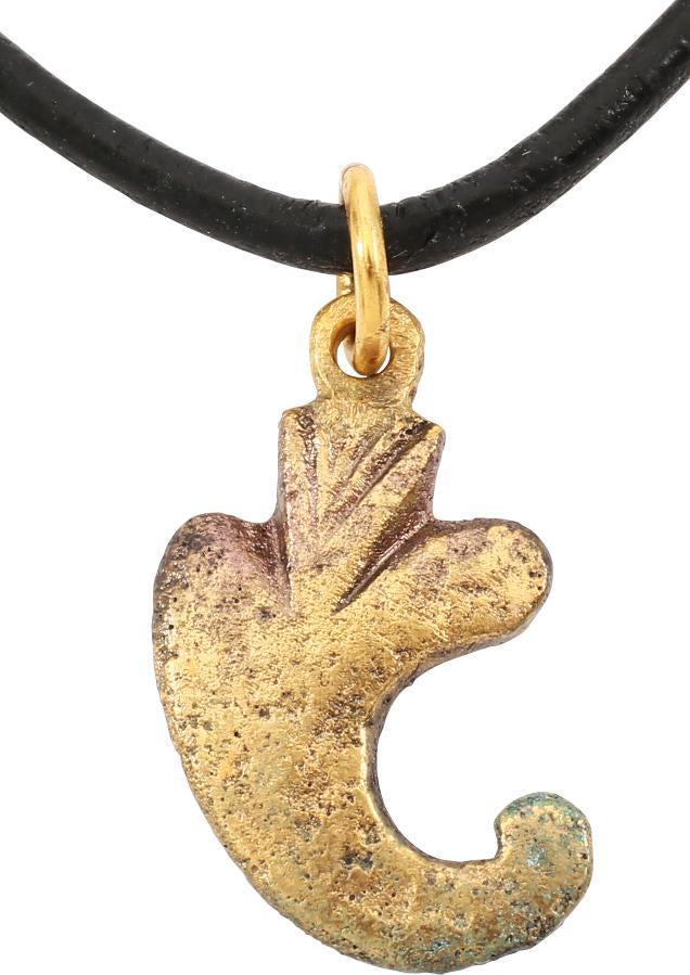 ROMAN CORNUCOPIA PENDANT: 1ST-3RD century AD. Gilt bronze, ¾” height with the curved horn spewing its bounty. Professionally refurbished with the 24karat gold surface restored on a polished leather neck cord. Gift boxed wit