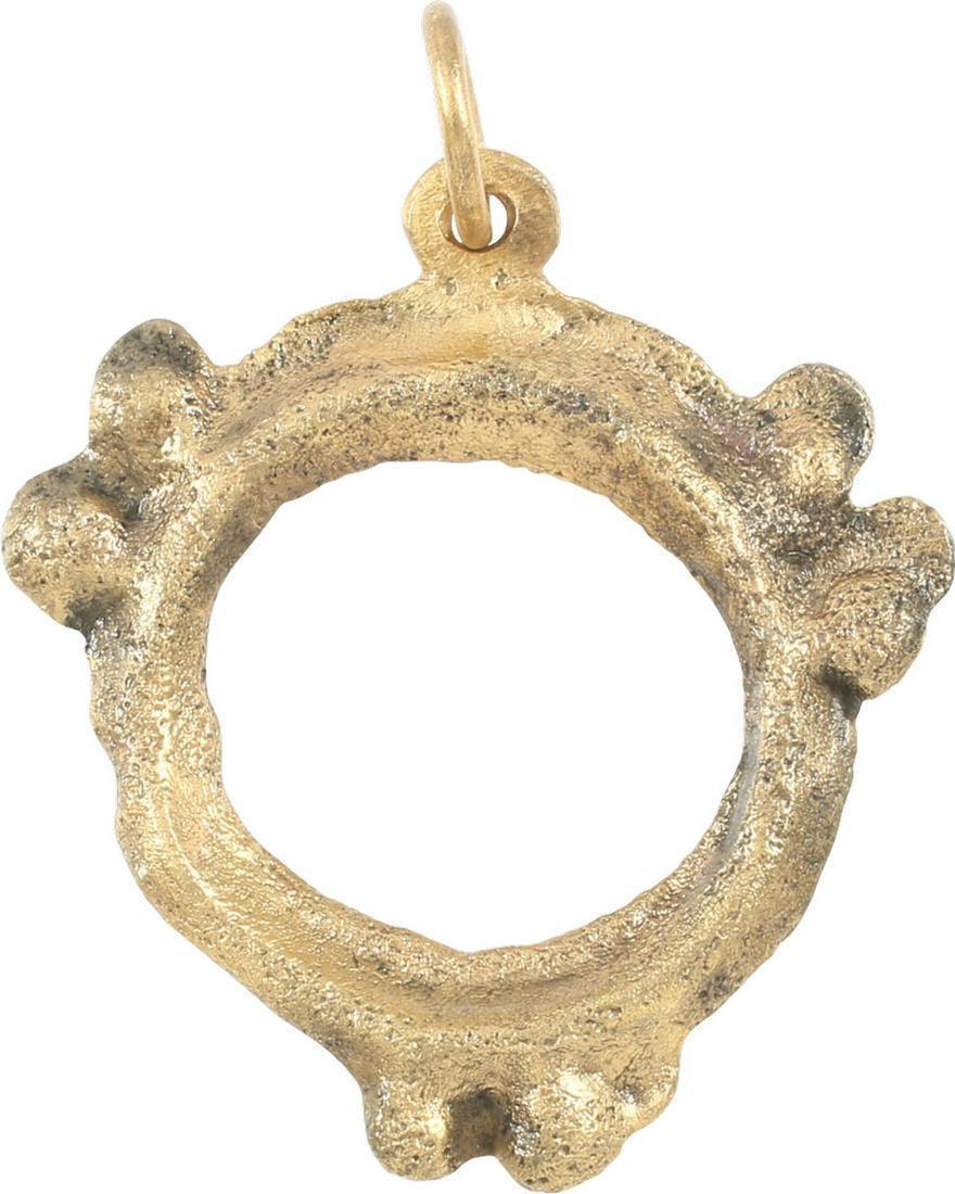 RARE VARIANT CELTIC PROSPERITY RING, 5th-2nd CENTURY: 1 1/8” width. Complex form, a ridged ring with double spheres at the third point. This and other variations are known and rarely seen. It is not certain how they accord with standard forms but are l