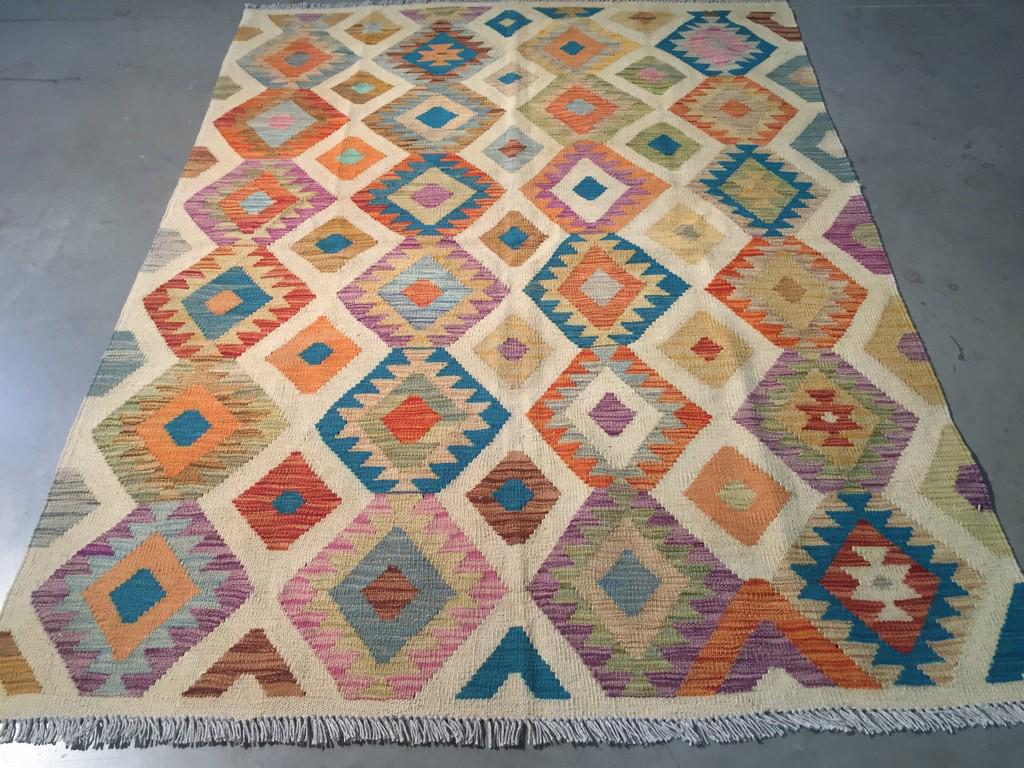 COLORFUL HAND KNOTTED KLIM 5x6.6: Title: COLORFUL HAND KNOTTED KLIM 5x6.6 Description: 5'.0"X 6'.6" Colorful 100% wool reversible Klim rug in multi pastel colors Hand Knotted in Pakistan Reserve: $120.00 Shipping: Domestic: Flat-rate 