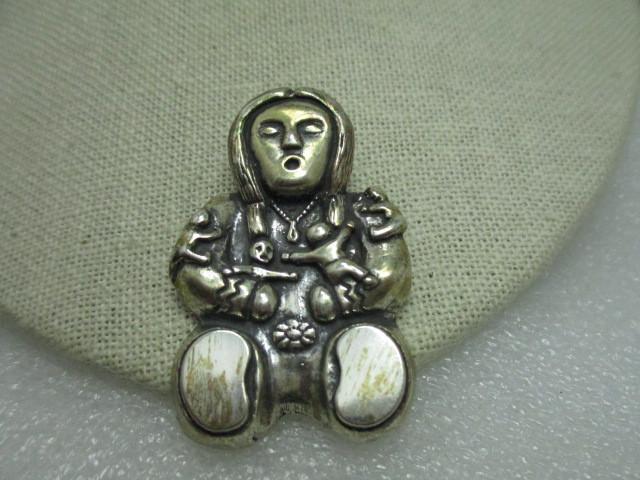 Sterling Silver Pueblo Indian Storyteller Brooch, 2",: Sterling SIlver Pueblo Indian, Southwestern/Mexican Storyteller brooch - very heavy and weighs in at a hefty 25.74 grams. It is signed 8-93 and B.W. It is 2" tall and 1.25" wide. Super good quality wi