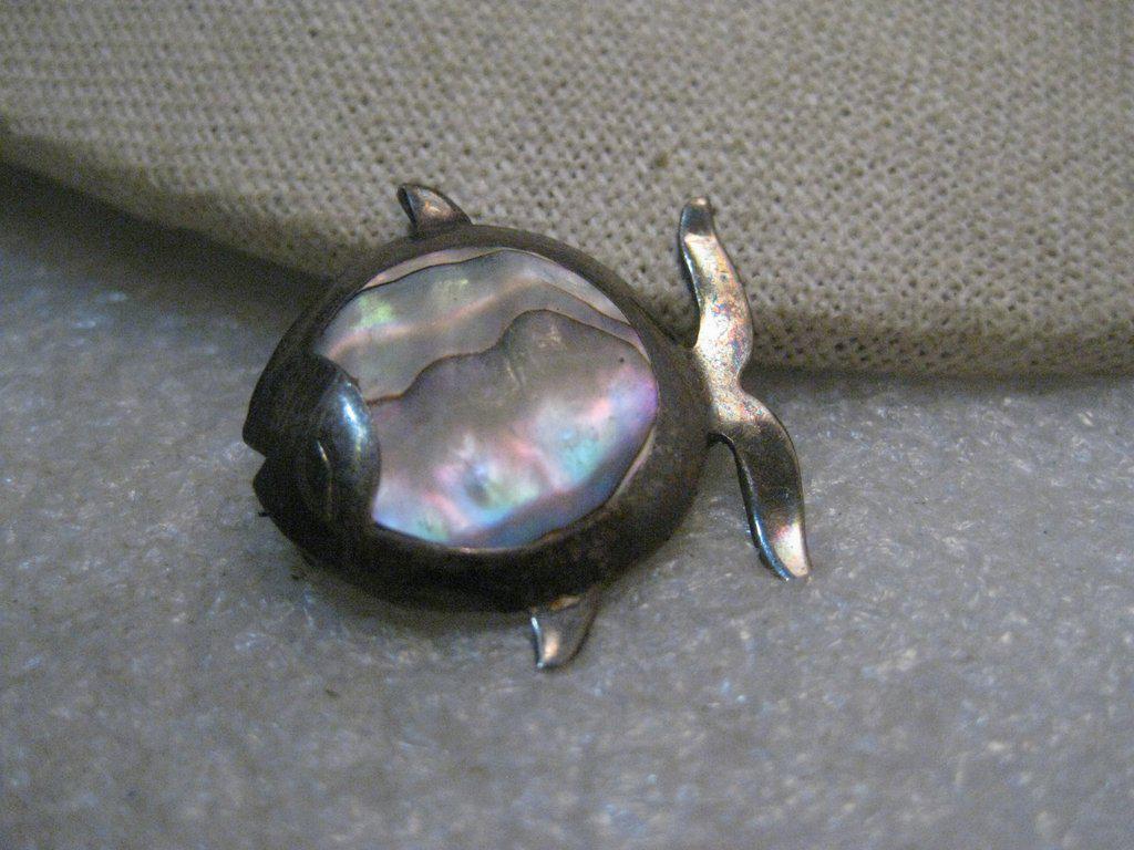 Vintage Sterling Taxco Abalone Fish Brooch, signed SCH: Sterling Silver Abalone Fish Brooch signed Taxco, Mexico, SCH 1925, 3.50 grams and 1-1.8" tall and slightly longer. Mid-Century/1950's. It is a cute rounded fish - bubble shaped with a tail that point