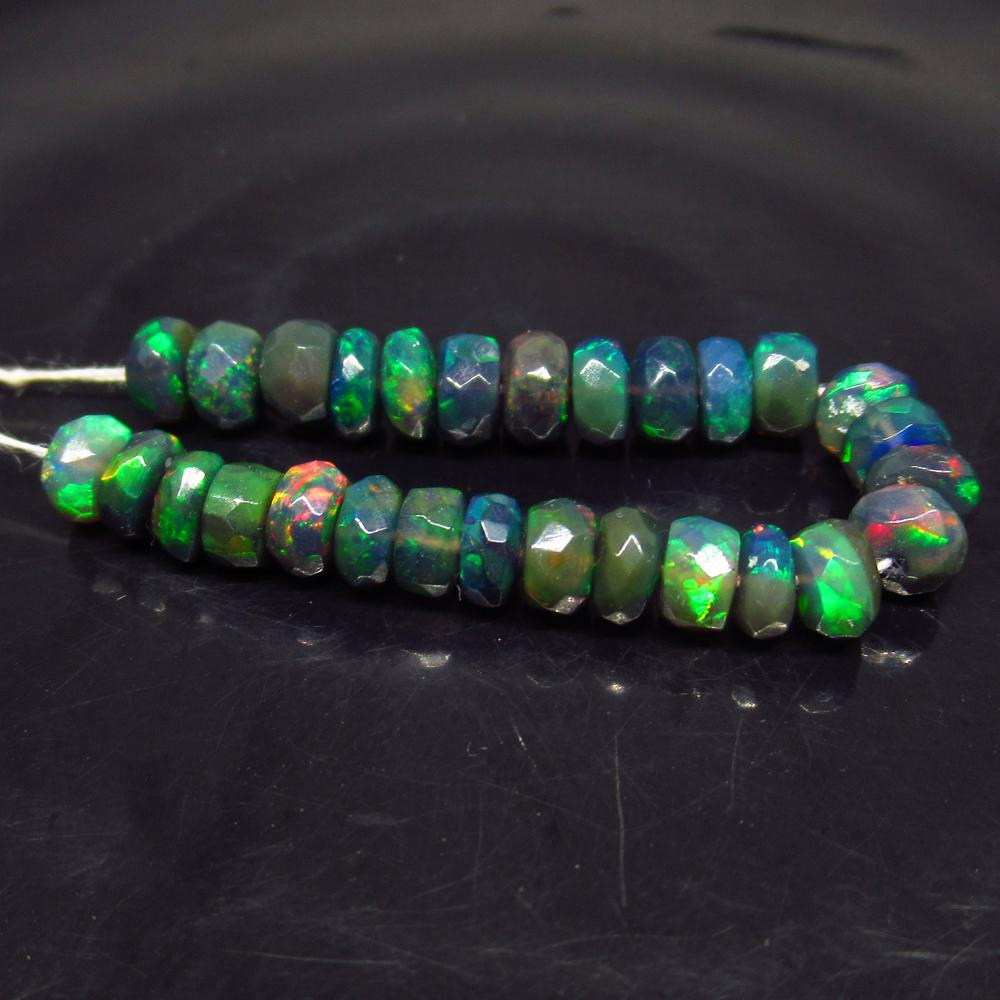 8.29 Ct Natural 28 Drilled Faceted Fire Black Opal: No Reserve! Title: 8.29 Ct Natural 28 Drilled Faceted Fire Black Opal Beads Stone Clarity: Translucent Gemstone: Natural Faceted Black Opal Beads Carat Weights: 8.29 Size/Dimensions: 4.60 to 4.80 mm /