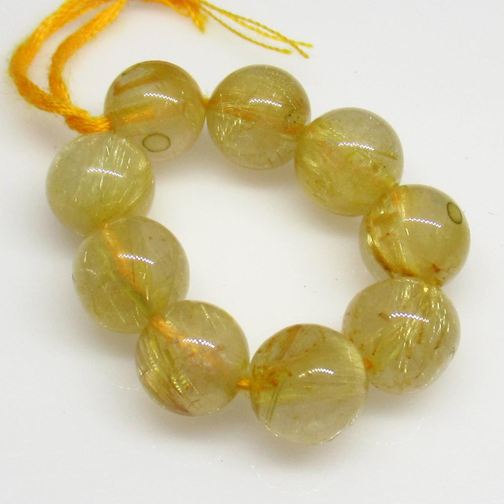 28.20 Ct Natural 9 Golden Rutile Quartz Round Ball (1 of 2)