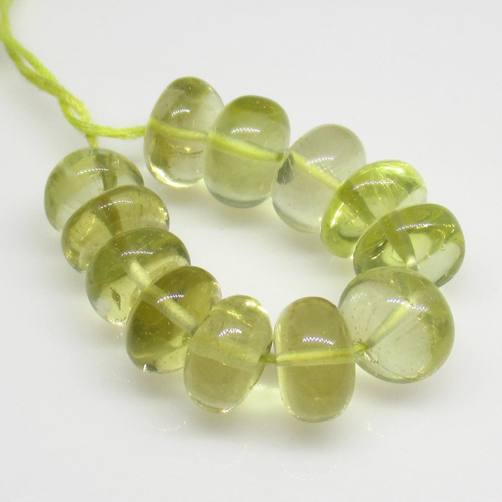 42.77.Ct Natural 12 Lemon Quartz Round Beads: No Reserve! Title: 42.77.Ct Natural 12 Lemon Quartz Round Beads Stone Clarity: Transparent Gemstone: Natural Lemon Quartz Beads Carat Weights: 42.77 Size/Dimensions: 8.50 to 9.60 mm / 12 PC's Top Clas