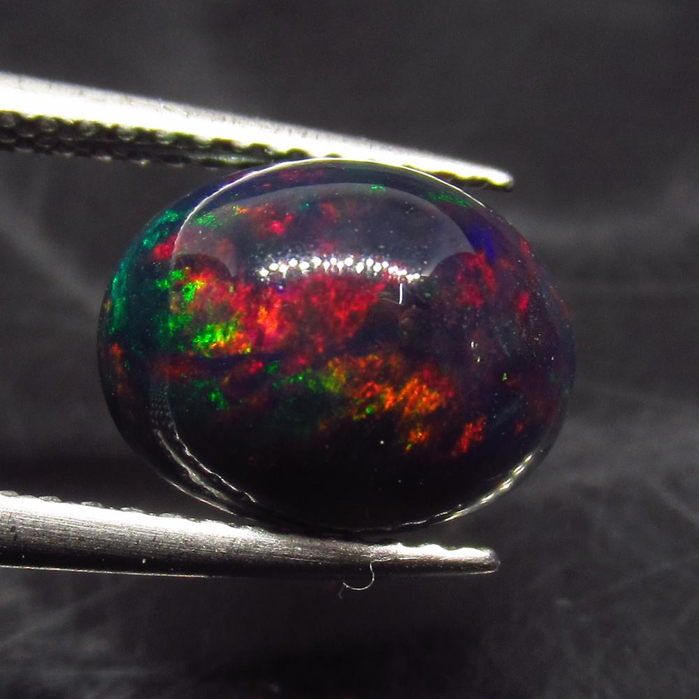 2.05 Ct Natural Ethiopian Fire Black Opal Oval Cab (1 of 3)