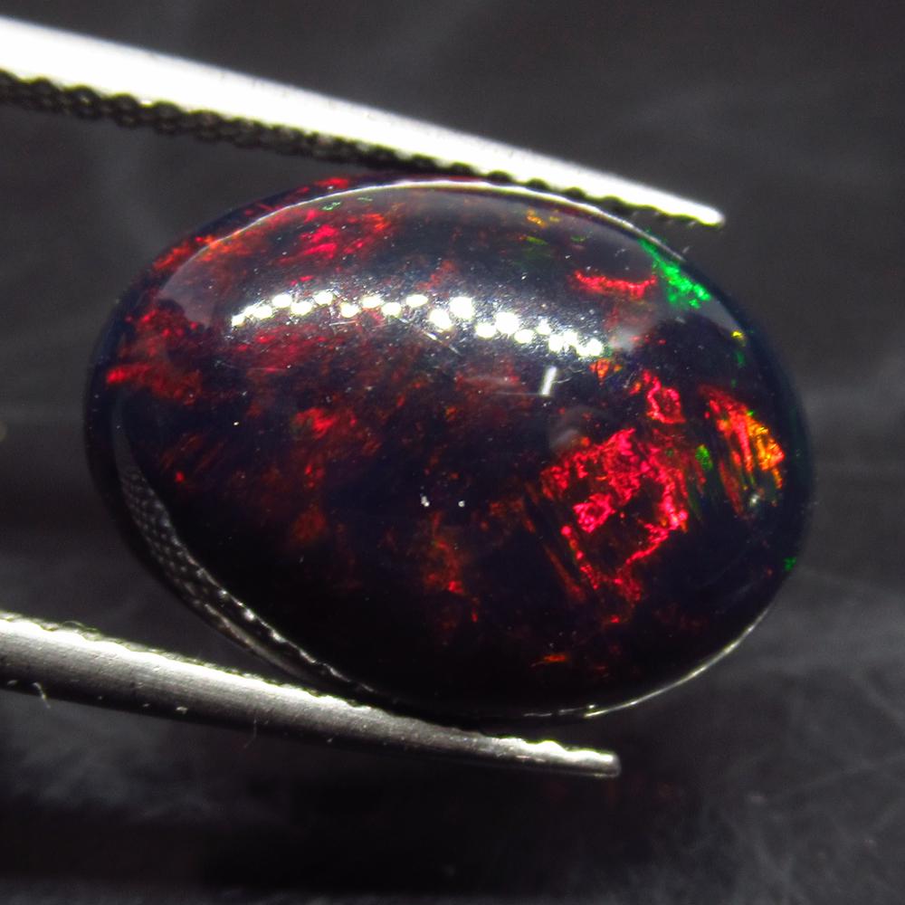 4.33 Ct Natural Ethiopian Fire Black Opal Oval Cab (1 of 2)