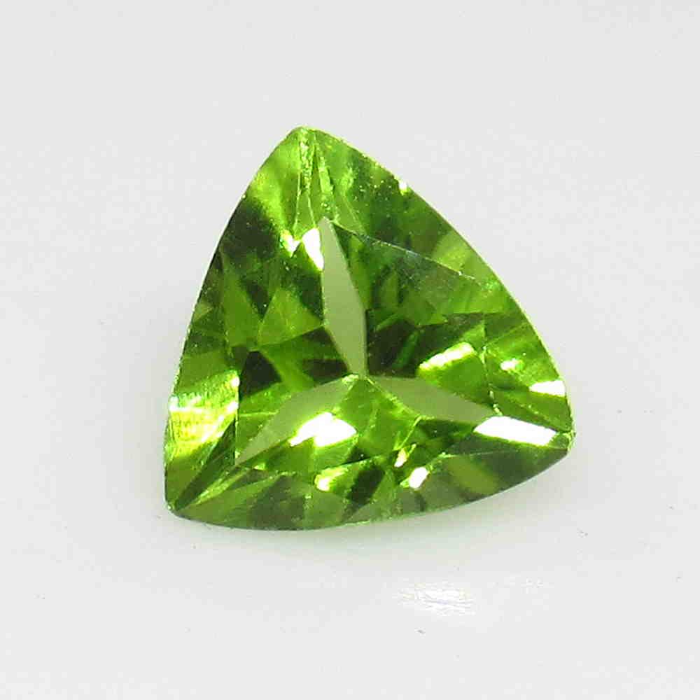 1.24 Ctw Natural Pakistan Peridot Trillion Cut: No Reserve! Title: 1.24 Ctw Natural Pakistan Peridot Trillion Cut Stone Clarity: VVS Gemstone: Peridot Carat Weight: 1.24 Size/ Dimensions: 7.20 x 7.10 x 4.30 mm Top Class Luster / Excellent Trillion 