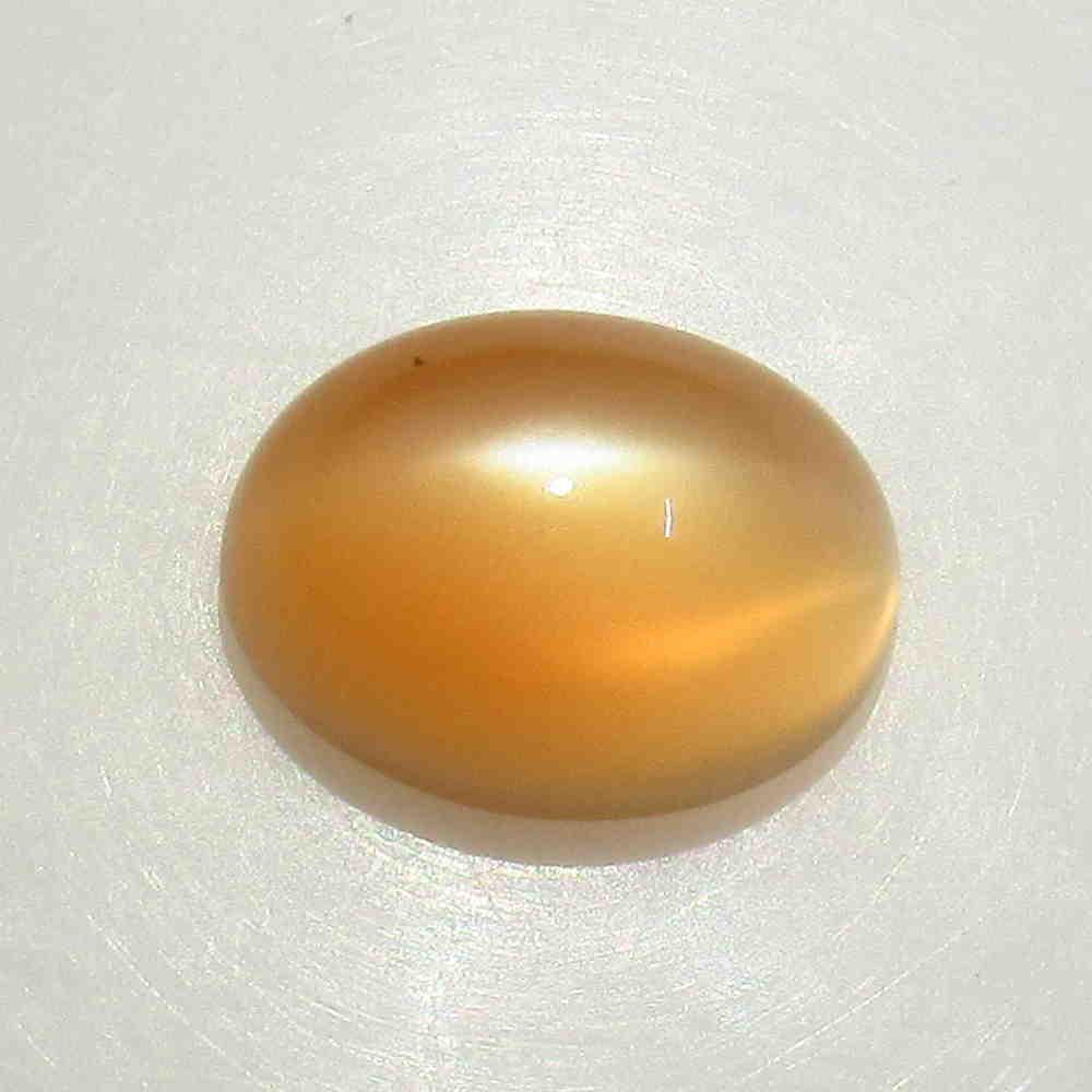 7.65 Ctw Natural Orange Moonstone Oval Cab: No Reserve! Title: 7.65 Ctw Natural Orange Moonstone Oval Cab Stone Clarity: Transparent Gemstone: Moonstone Carat Weight: 7.65 Size/ Dimensions: 14.10 x 10.50 x 7.50 mm Nice Oval Cabochon / Top Quali