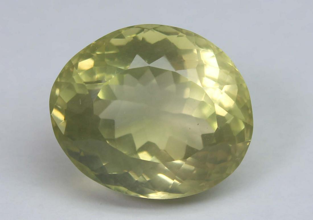 10.80 Ct Natural Lemon Quartz: No Reserve! Title: 10.80 Ct Natural Lemon Quartz Additional Information: Gemstone : Natural Lemon QuartzWeight : 10.80 CtsShape : Oval CutColour : Greenish Yellow Dimensions : 14.8x12.5x10.1 mmOrigin 